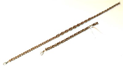 Lot 74 - A fancy link necklace, stamped '375', length 41cm; and a similar bracelet, stamped '9CT',...