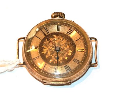 Lot 78 - A lady's Continental wristwatch stamped 14k with engine turned decoration