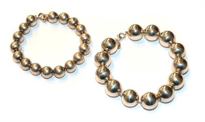 Lot 86 - Two silver bead bracelets, lengths 19cm and 21cm, both stamped 'Tiffany & Co.'