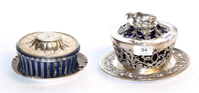 Lot 94 - An Old Sheffield plated butter-dish, stand and cover, with silver finial, the dishes and stands...