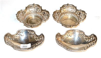 Lot 102 - A pair of George V silver dishes, by Mappin and Webb, London, 1930, shaped oval with egg and...
