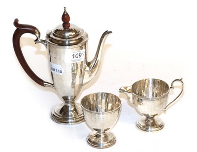 Lot 109 - A three-piece George V Silver coffee-service, by Adie Brothers, Birmingham, 1930, each piece...