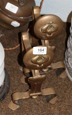 Lot 164 - A pair of Art Nouveau brass andirons