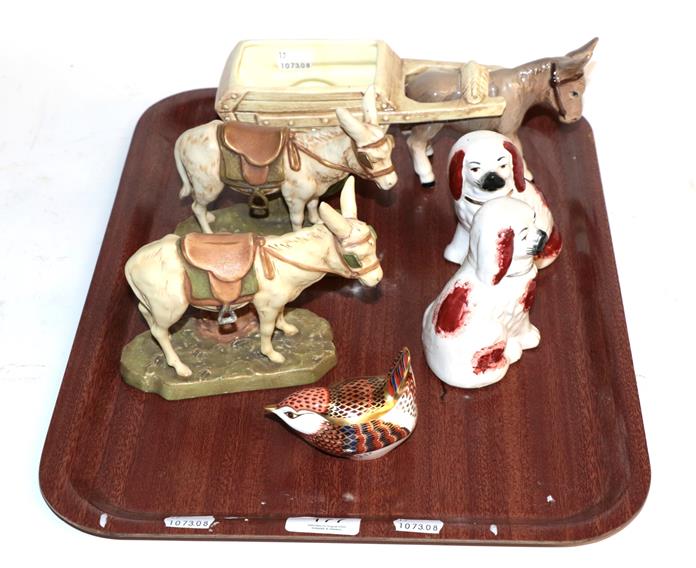 Lot 177 - A tray comprising two Royal Dux donkeys, Royal Crown Derby paperweight, Sylvac donkey and a pair of