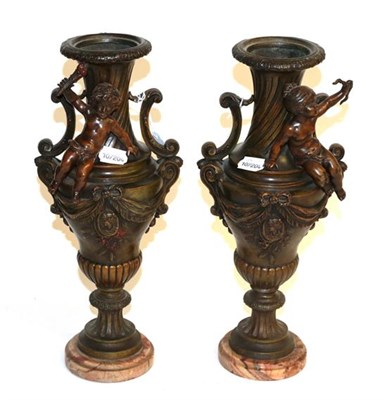Lot 191 - A pair of late 19th/early 20th century bronzed cherub vases