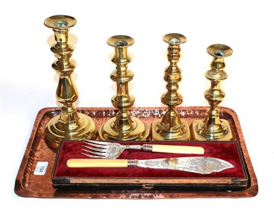 Lot 194 - A cased pair of silver fish servers, two pairs of candlesticks and a copper tray