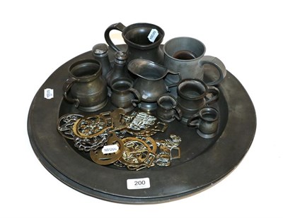 Lot 200 - A pair of pewter charges, pewter mugs, horse brasses, etc