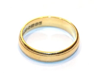 Lot 221 - An 18 carat gold band ring, finger size M