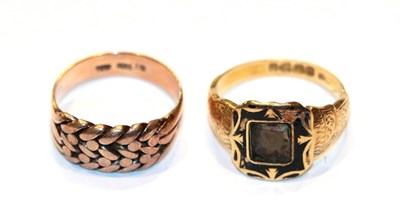 Lot 222 - An 18 carat gold mourning ring, finger size R; and a rope work ring, stamped '9CT', finger size...