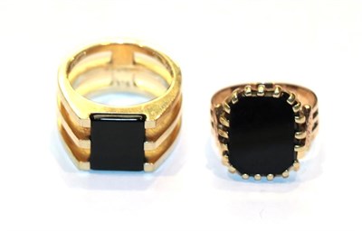 Lot 240 - An onyx ring, stamped '9CT', finger size Q1/2; and another signet ring, unmarked, finger size P