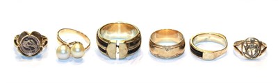 Lot 241 - A 9 carat gold band ring, finger size K1/2; a 9 carat gold Scottish thistle ring, finger size G1/2