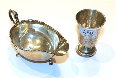 Lot 250 - A George V silver sauce-boat, by Northern Goldsmiths, Birmingham, 1931, with shaped rim, 15.5cm...