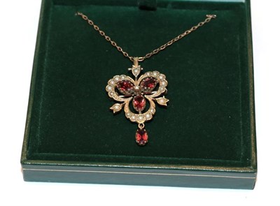 Lot 251 - A 9 carat gold garnet and split pearl brooch/pendant on chain, pendant length 4.0cm, chain...