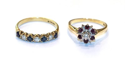 Lot 253 - An 18 carat gold sapphire and diamond seven stone ring, finger size Q; and an 18 carat gold...