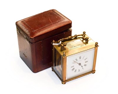 Lot 319 - A brass carriage timepiece with fitted travelling case