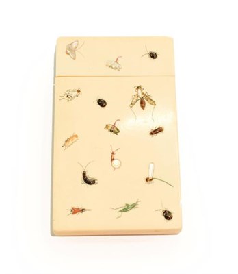 Lot 321 - A Japanese Shibayama card-case, 19th century, oblong, one side applied with insects, the other with