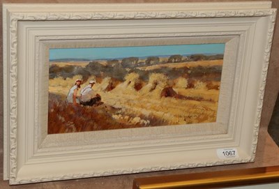 Lot 1067 - John Haskins (b.1938) Figures at rest beside a cornfield Signed, oil on panel, 14cm by 29.5cm...
