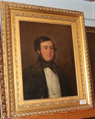 Lot 1148 - Follower of Sir Francis Grant Portrait of a gentleman, head and shoulders, wearing a black...