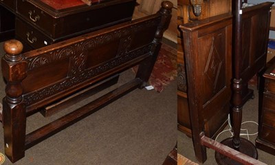 Lot 1250 - An oak framed double bed in the 17th century style with panelled head and foot board, 138cm wide