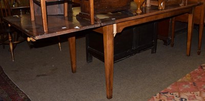 Lot 1256 - A Provincial draw leaf farmhouse dining table, possibly French, 79cm by 230cm (extended) by...