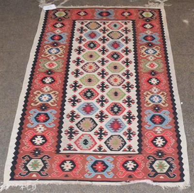 Lot 1257 - Turkish Kilim, ivory around hexagons, enclosed by backed motifs