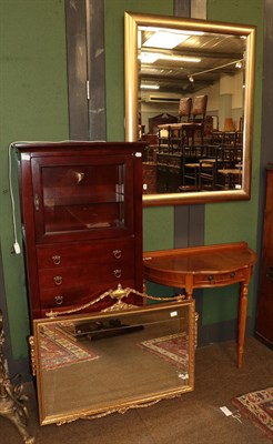 Lot 1263 - A modern Wellington style display cabinet, the glazed upper section over six drawers, plinth...