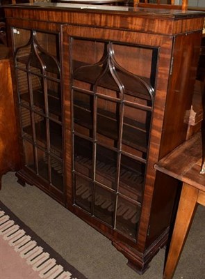 Lot 1265 - A 19th century mahogany bookcase, twin astragal glazed doors, adjustable shelf interior and moulded