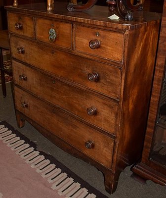 Lot 1266 - A George III mahogany chest of drawers, three short drawers over three long drawers and bracket...