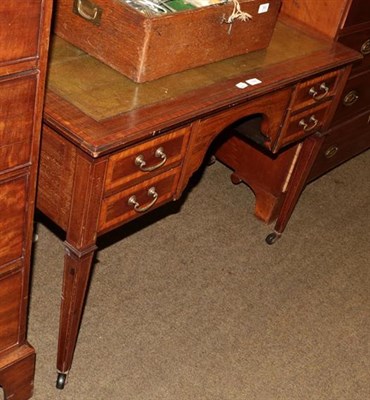 Lot 1288 - An Edwardian mahogany cross banded kneehole desk, green leather inset, four drawers with square...