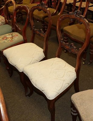 Lot 1293 - A pair of Victorian balloon back dining chairs, with two others (4)