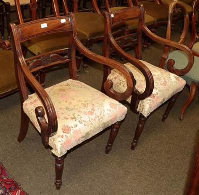 Lot 1294 - A pair of early 19th century mahogany open armchairs (2)