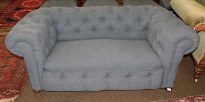 Lot 1299 - A Chesterfield style drop end button back settee, 170cm wide