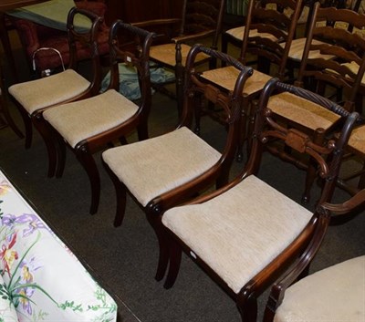 Lot 1306 - A set of four Regency mahogany rope twist dining chairs, sabre legs and drop in seats (4)