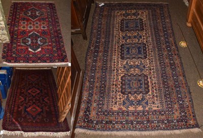 Lot 1336 - Baluch rug, the field with three serrated guls enclosed by narrow borders 195cm by 112cm,...