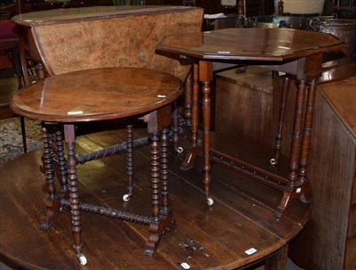 Lot 1349 - A Victorian burr walnut Sutherland table with an oval top on turned supports with porcelain...