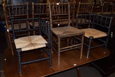 Lot 1353 - A set of five 19th century faux bamboo rush-seated chairs with spindle-backs, together with two...