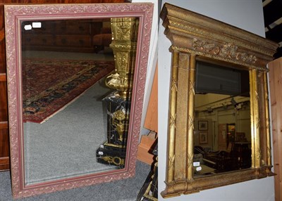 Lot 1390 - A gilt wall mirror of architectural form with another mirror (2)