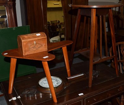 Lot 1397 - An Edwardian mahogany occasional table, a 1950's table, a 19th century tea caddy and a wheel...