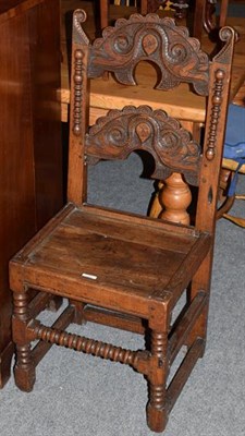 Lot 1401 - A late 17th century carved oak side chair, in the Derbyshire style