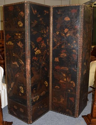 Lot 1418 - A 19th century four-leaf close-nailed dressing screen, covered in Russian leather, each panel...