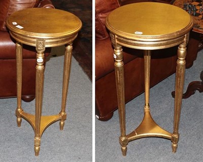 Lot 1425 - A pair of modern gilt jardiniere stands