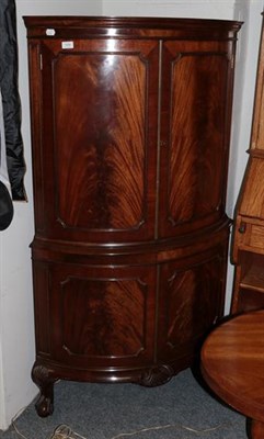 Lot 1439 - A George III style mahogany veneered corner drinks cabinet