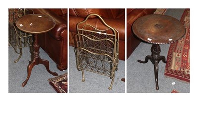 Lot 1445 - An Edwardian brass and wirework magazine rack; a mahogany circular tilt-top table and a wine...