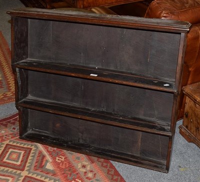 Lot 1448 - An 18th century oak hanging wall shelf