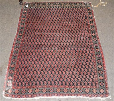 Lot 1269 - Malayir carpet, the field of boteh enclosed by stylised vine borders, 364x154cm