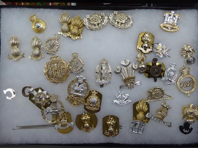 Lot 25 - A Collection of Approximately One Hundred and Fifty Elizabeth II Staybrite Badges, cap, collar...