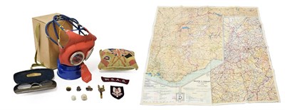 Lot 47 - A Small Quantity of Militaria, comprising a Second World War Mickey Mouse respirator for a...