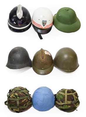 Lot 95 - A Swiss Combat Helmet, with leather cushioned three pad liner; a US Combat Helmet, with leather...