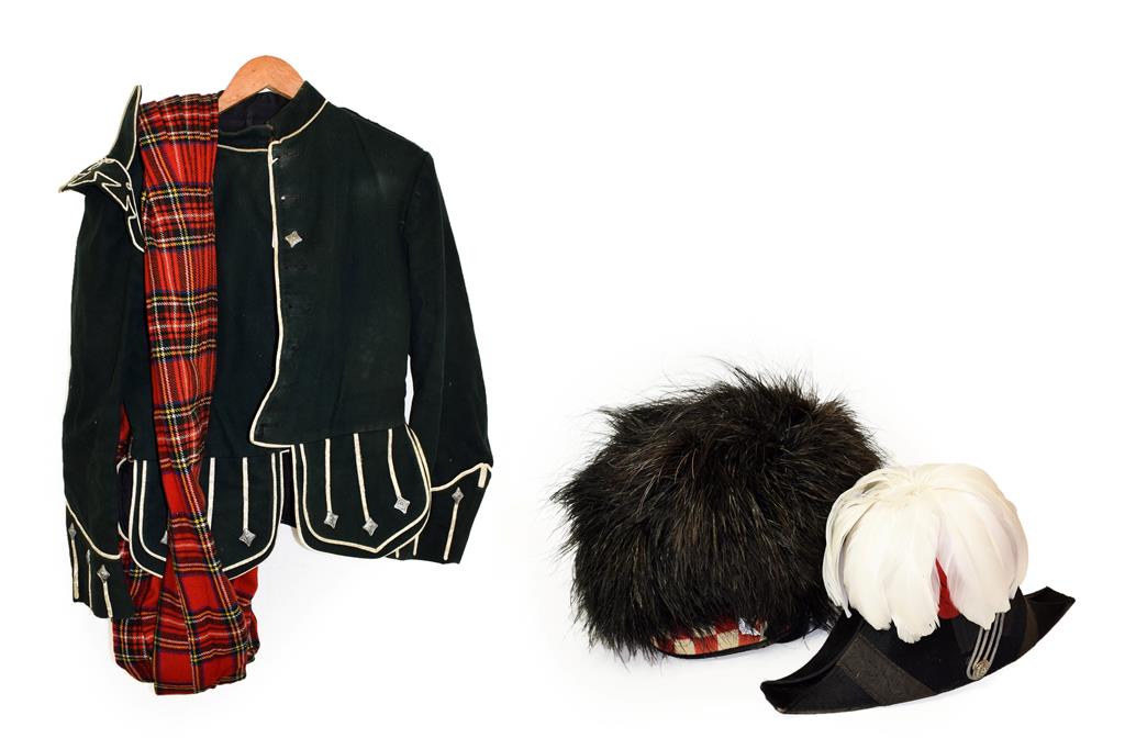 Lot 101 - A 20th Century Highland Piper's Uniform, comprising a feather bonnet with chequered band, a...
