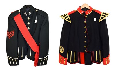 Lot 108 - A Black Watch Piper's Blue Doublet, with red collar, shoulder tabs, cuffs and piping, staybrite...